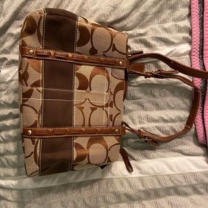 Coach purse. Broken strap but otherwise in great condition!